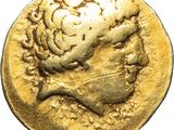 une pièce d'or sur laquelle est représentée la tête d'un homme