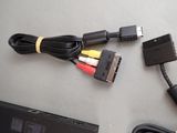 a couple of cables connected to a laptop on a table