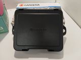 a black toaster sitting on top of a white counter