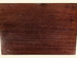 an image of a piece of wood that has been scratched off