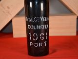 a bottle of wine that is sitting on a table