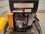 a small engine that is sitting on a cart