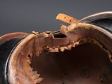 a close up view of a vase with a broken lid