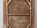 an old wooden easel with a piece of wood on top of it
