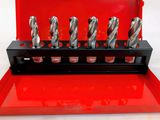 a close up of a set of drill bits in a red case