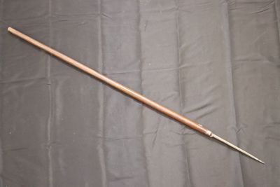 an image of a wooden stick with a long handle