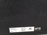 a close up of a black box with a label on it