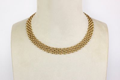 a close up of a mannequin necklace on a mannequin mannequin