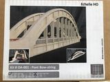 a box with a picture of a model of a bridge