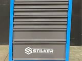 a close up of a blue and gray tool cabinet on wheels