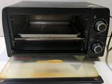 a toaster oven that is sitting on a counter