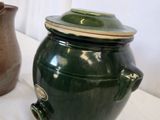 two vases that are sitting on a table