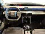 a picture of a car dashboard with a steering wheel and dashboard lights