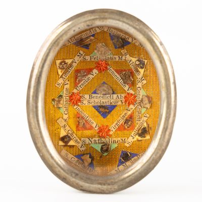 an image of a close up of a clock on a white surface