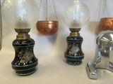 three lamps that are hanging on the wall