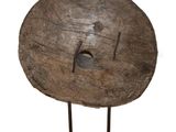 a wooden object with a hole in the middle of it