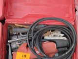 a red tool box with tools inside of it