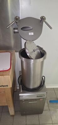 a silver mixer sitting on top of a metal box