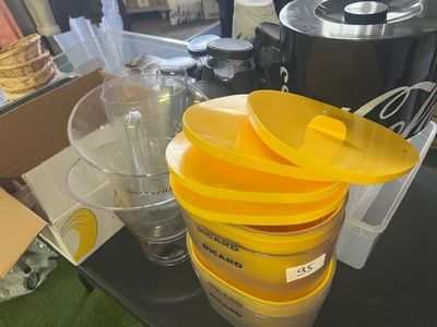 a stack of plastic containers sitting on a table