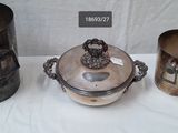 three different types of silverware on display on a table