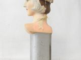 an image of a mannequin head with a hat on it ' s head