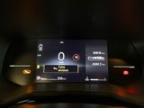 the dashboard of a car with a digital display on it ' s display screen