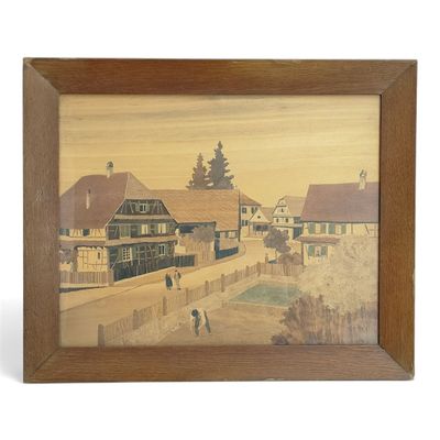 framed painting of a village scene with people walking on a street