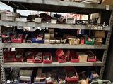 a shelf full of assorted tools in a garage
