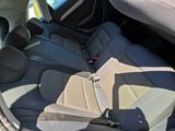 a seat in the back of a car that is empty