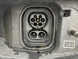 a close up view of a car ' s electrical outlet