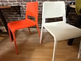 three chairs that are sitting next to each other on the floor