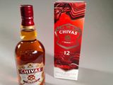 a bottle of chivas 12 years old next to a box of 12 years old