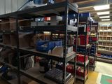 many shelves with various items on them in a store
