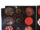 two laptops that have different designs on them