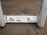 a close up of a danger sign on a metal pole