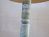 a lamp that is sitting on top of a table