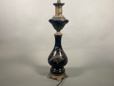 a lamp that is sitting on a table in the room