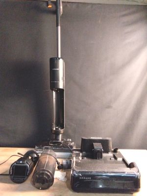 an image of a camera and a microscope on a table