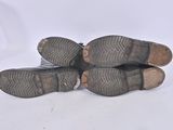 a pair of shoes that are laying on the ground