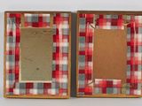 two red and white plaid picture frames with a picture in the middle