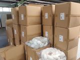 many boxes that are stacked up in a warehouse