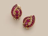 a pair of ruby and diamond ear clips