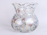 a glass vase with a design on it on a white background