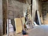 many pieces of wood that are sitting on the floor