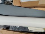 a pile of boxes and a roll of paper on top of each other