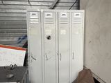 two lockers and a washing machine in a room