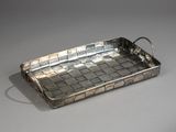 silver plated tray with handles and handles on a grey surface