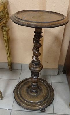 a small table that is on the floor next to a chair