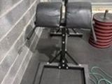 an image of a gym equipment set up in a garage