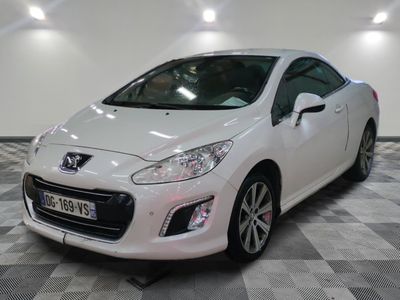 a picture of a white car on a checkered floor